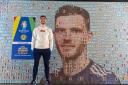 Andy Robertson at the unveiling of a mural made up of 5,000 playing cards