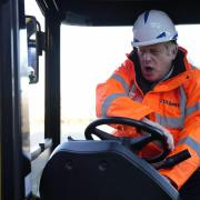 Prime Minister Boris Johnson drives a forklift during a visit to the Tilbury Docks in Essex. Picture date: Monday January 31, 2022.