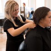 Learning - ACL Essex hairdressing learner in ACL Colchester Salon with client. Picture: ACL Essex