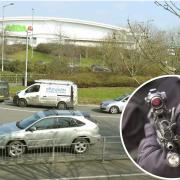 Incident  - an image of Colchester's Asda, and an inset image of an armed police officer