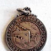 One of the souvenir badges