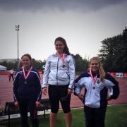 Hammer champion Katie Head on top of the podium at the England Championships