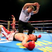 Down and out - John Wayne Hibbert after he was knocked out by Martin Gethin