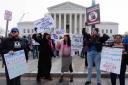 Anti-abortion demonstrators protest outside of the Supreme Court in Washington (Jose Luis Magana/AP, File)