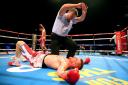 Down and out - John Wayne Hibbert is knocked down by Martin Gethin