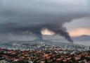 Smoke rises during protests in Noumea, New Caledonia, on May 15 (Nicolas Job/AP)