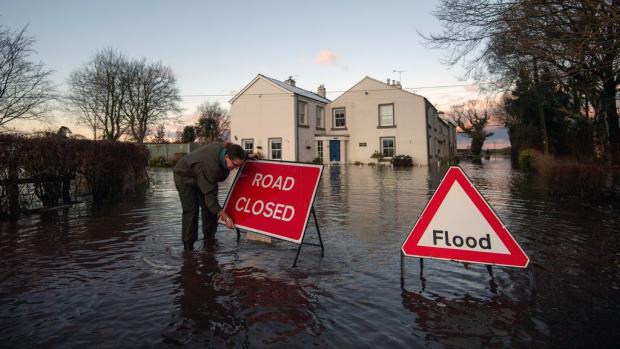 Thurrock Gazette: Homes at risk of flooding are urged to follow advice from the Environment Agency. (PA)