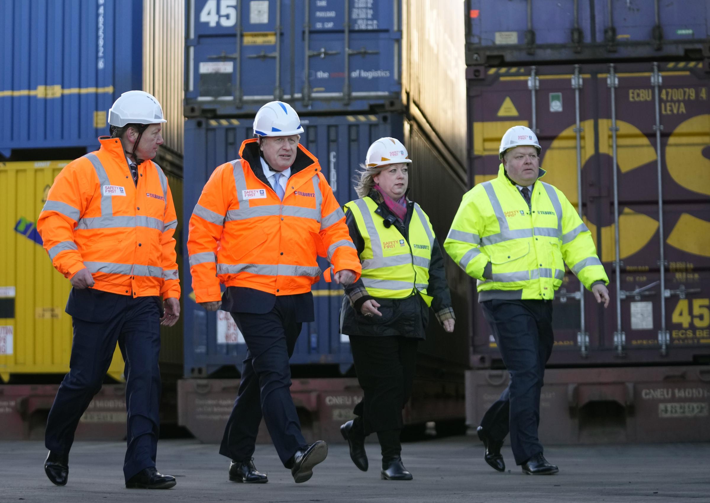 Prime Minister Boris Johnson (second left) walks with (from left) Charles Hammond, Group CEO Forth Ports, MP Jackie Doyle Price and Paul Dale, Asset Site Director of the Port of Tilbury during a visit to Tilbury Docks in Essex. Picture date: Monday