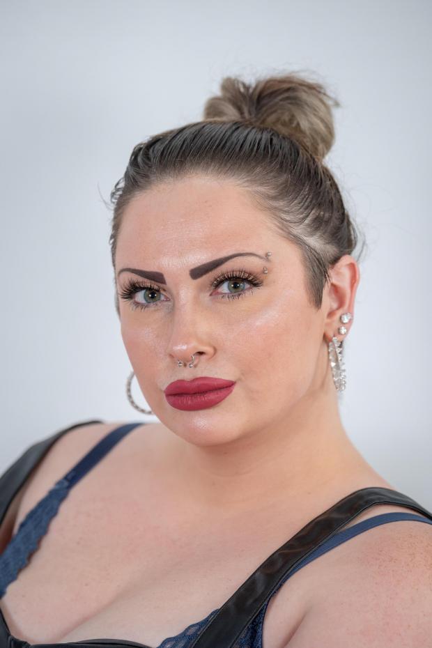 Thurrock Gazette: Ellesha McKay, 27, works as a porn star and dominatrix from her flat in Essex. Picture: SWNS