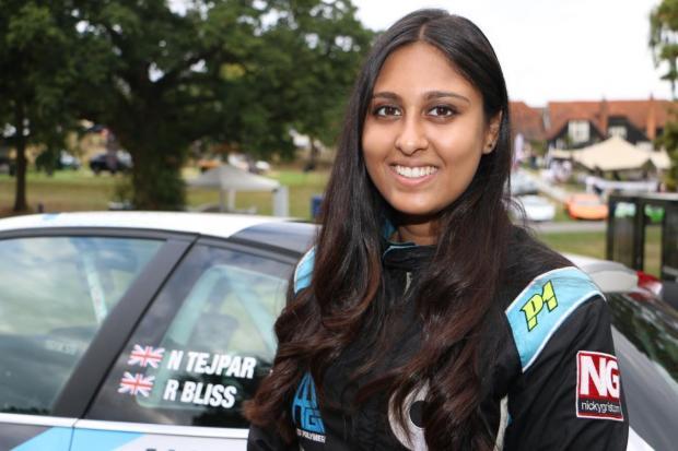 Thurrock Gazette: Nabila Tejpar is pictured with her rally car at the Warren Classic and Super Car Show, near Maldon. Picture: VisitEssex/BigWavePR
