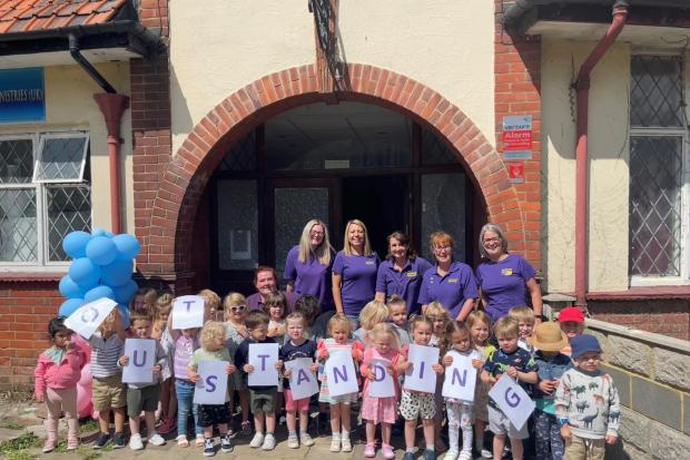 Outstanding - Children and staff celebrate the Ofsted rating