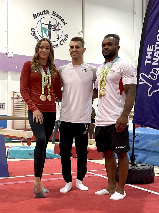 Thurrock Gazette: Max Whitlock (centre), Georgia-Mae Fenton (left) and Courtney Tulloch at the South Essex Gymnastics Club (PA)