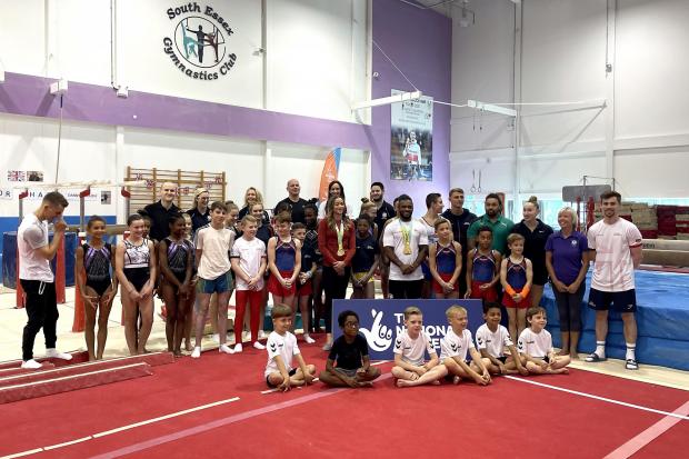 Thurrock Gazette: Max Whitlock (left), Georgia-Mae Fenton (centre) and Courtney Tulloch poses for photographers at the South Essex Gymnastics Club (PA)