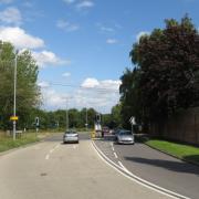 The A113 approaching the junction with Chigwell Lane, near Chigwell