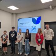 Left to right, Essex pupils and ambassadors Charlie, 10, Jonathan, 16, Alissa, 11, Dilly, 15, and Angel, 11, with Kierran Pearce, who set up the Multi-Schools Council