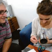Seeing the light – Alan Hockett with reporter Hannah Marsh and a tin can transformed into a pinhole camera