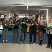 Services - Councillor Hartstean with staff from Every Child Online and Grays Library