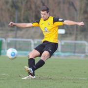Key figure - Michael Clark, pictured playing in his final game for the club against Hemel Hempstead Town in February